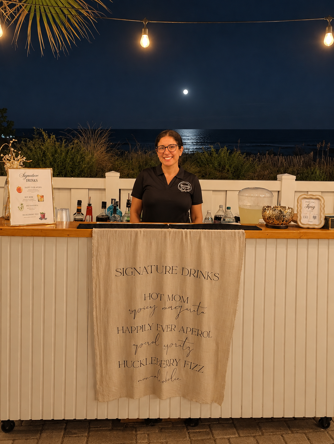 Bartender pouring a craft cocktail